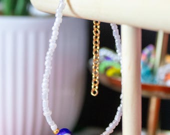 Boze oogkralenarmband: handgemaakte beschermingssieraden