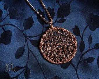 Gold hand crochet knitted circle pendant necklace made from 14kt gold filled wire.