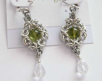 Peridot and Swarovski crystal dangling Sterling Silver earrings