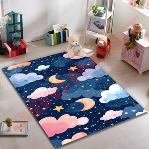 Alfombra infantil con diseño de noche estrellada, bonita alfombra de juego con luna y estrellas, suave alfombra para guardería, alfombra con temática de galaxia, acogedora decoración para el suelo de la habitación de los niños pequeños