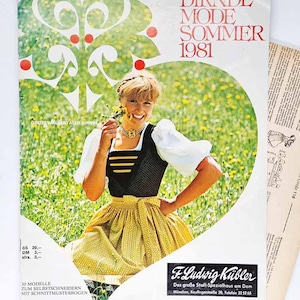 May include: A magazine cover from 1981 with a woman in a traditional dirndl dress. The cover reads "DIRNDL MODE SOMMER 1981" and "GROSSWALSERTALER DIRNDL". The woman is smiling and holding flowers in a field of yellow flowers.
