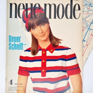 May include: A vintage magazine cover with a woman in a red, white, and blue striped top and headband. The magazine title "neue mode" is in large black letters. The cover also features the text "Neuer Schnitt" and the date "APRIL 1966".