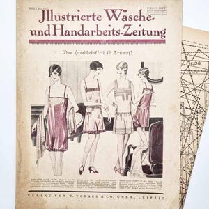 May include: Vintage magazine cover titled "Illustrierte Wäsche und Handarbeits-Zeitung" from 1927, featuring illustrations of women in lingerie. The cover is aged with visible wear and tear, and includes text in German.