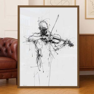 May include: A framed black and white sketch of a person playing a violin. The artwork is a loose, expressive drawing with visible brushstrokes. The frame is a warm brown color, and the artwork is displayed in a well-lit room.