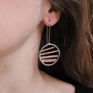 Round earrings  made of Sterling silver and copper, lightweight and comfortable to wear