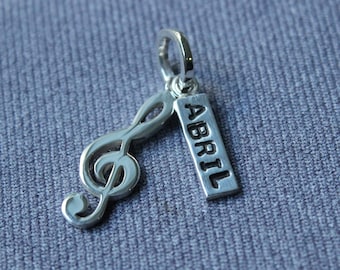 Sterling silver  treble clef charm with name. Personalized