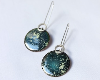 Enameled Incompatibility earrings made of  Sterling silver and copper with green turquoise enamel.