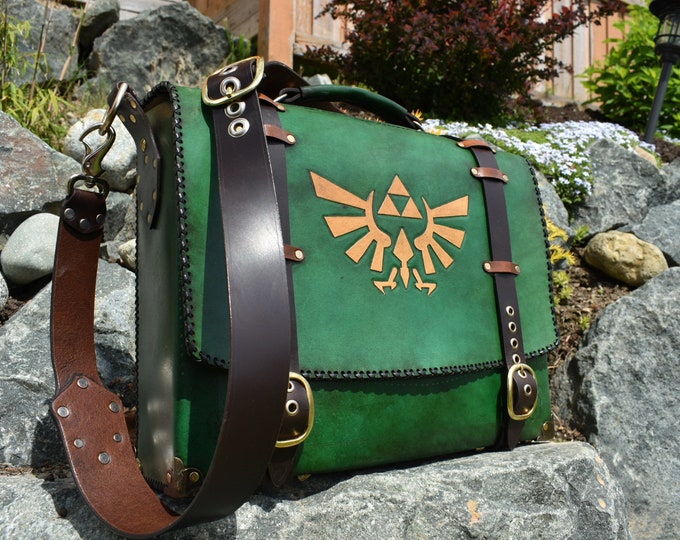 Zelda shoulder bag for work laptop bag quality leather tooled designs Zelda hyrule crest