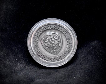 Lingotto di moneta rotonda di bufalo con scudo Hylian in argento pregiato