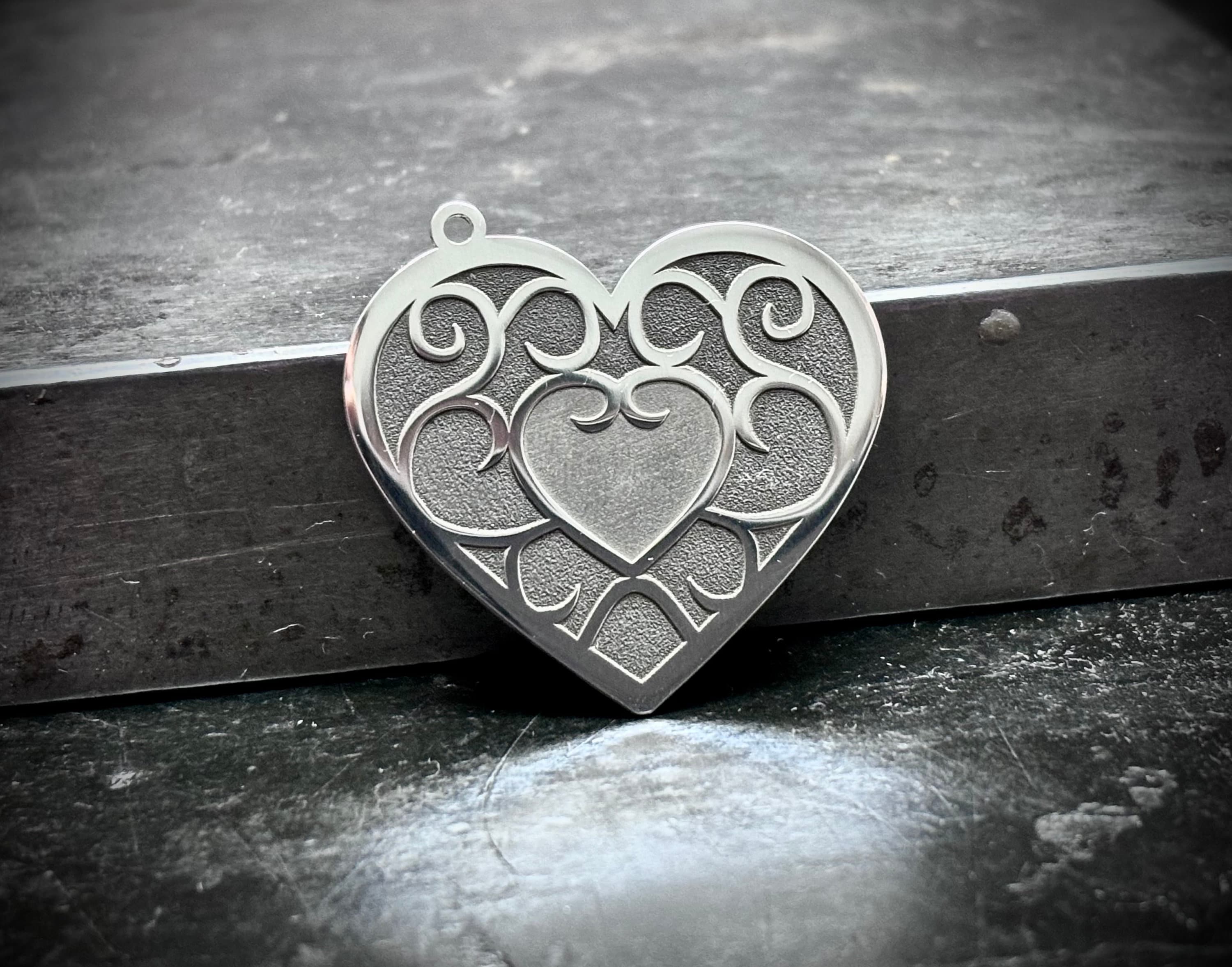 Silver heart pendant made using .925 sterling silver sheet Silver heart pendant made using .925 sterling silver sheet