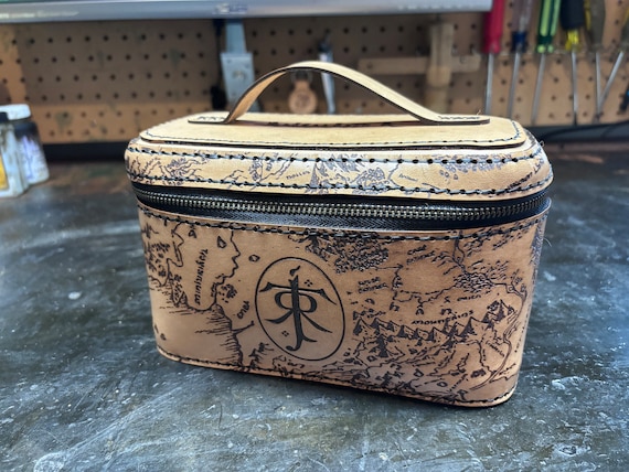 Middle earth leather case that could be used as a dopp travel kit, tobacco case or for anything you would like to store in it.