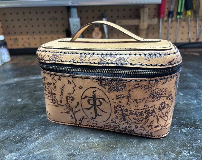 Middle earth leather case that could be used as a dopp travel kit, tobacco case or for anything you would like to store in it.