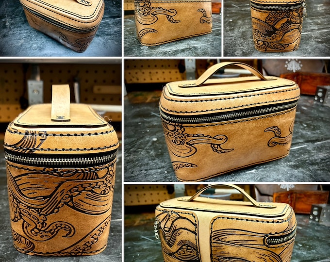 Leather case with engraved tentacles that could be used as a dopp travel kit, tobacco case or for anything you would like to store in it