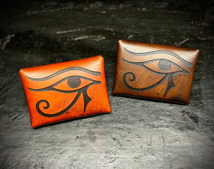 Leather card wallet with the Eye of Ra engraved into the back