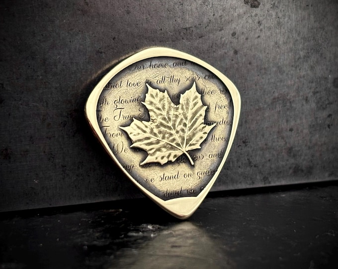 Canadian maple leaf guitar pick solid brass with O Canada lyrics