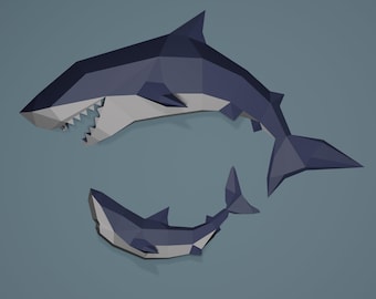 May include: Two stylized, geometric sharks in shades of blue and gray are depicted against a muted blue background. The larger shark has an open mouth revealing white teeth. The smaller shark is positioned below the larger one.