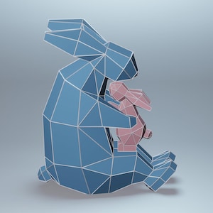 May include: A geometric sculpture of a mother rabbit and a baby rabbit. The larger rabbit is blue, and the smaller rabbit is pink. Both are composed of triangular shapes with white outlines, creating a low-poly effect. The background is a gradient of gray.