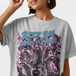 Rizz Em With The Tism Shirt-graphic tees,raccoon shirt,rizz em with the tism sweatshirt,raccoons sweatshirt,rizz em with the tism hoodie