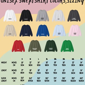 Op de afbeelding: Een tabel met de kleuren en maten van unisex sweatshirts. De tabel bevat 12 verschillende kleuren, met de naam van elke kleur gedrukt op het sweatshirt. De tabel bevat ook een maattabel met metingen in inches en centimeters voor breedte, lengte, mouwlengte en borstbreedte. De maten vari&euml;ren van S tot 5XL.