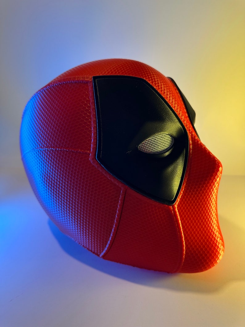 3D Printed Deadpool Helmet From Deadpool and Wolverine Movie. Held by