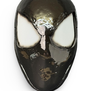 Symbiote Spider-man helmet from PlayStation Spider-man game. Held by magnets.