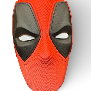 Deadpool helmet with realistic mask folds and accurate texture from Deadpool and Wolverine movie. Held by magnets.