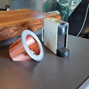 Cápsula gigante de cobre para café