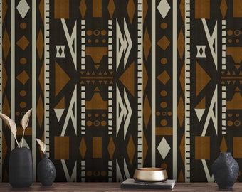 May include: A dark brown wooden cabinet with a geometric patterned wallpaper behind it. There are three black vases and a gold bowl on top of the cabinet.