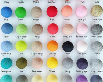 May include: A color palette of cotton ball lights in various colors, including dark denim, khaki, brown, burgundy, and more. The image displays a wide array of colors, from dark to light, with each color labeled. The text at the bottom reads "Cotton Ball Lights color palette: Classic Collection".