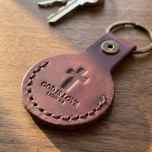 God is Love Leather AirTag Keychain — Christian Gift, Full-Grain Cowhide, Pentecost Red image 1