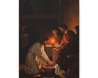 May include: A painting depicting a figure in a light-colored robe kneeling to wash the feet of another person in a dark room. A single candle on a table illuminates the scene, casting warm light on the figures and a brown basin.