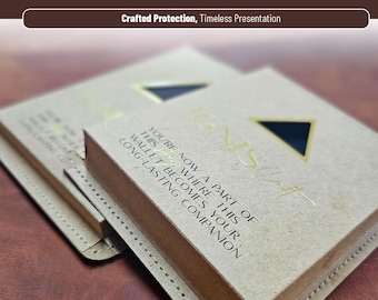 May include: Two light brown rectangular paper packages with stitched edges. The top package features a dark triangle logo and gold text reading: YOU'RE NOW A PART OF THIS WHERE THIS WALLET BECOMES YOUR LONG-LASTING COMPANION. IGNIS Craft is printed below.