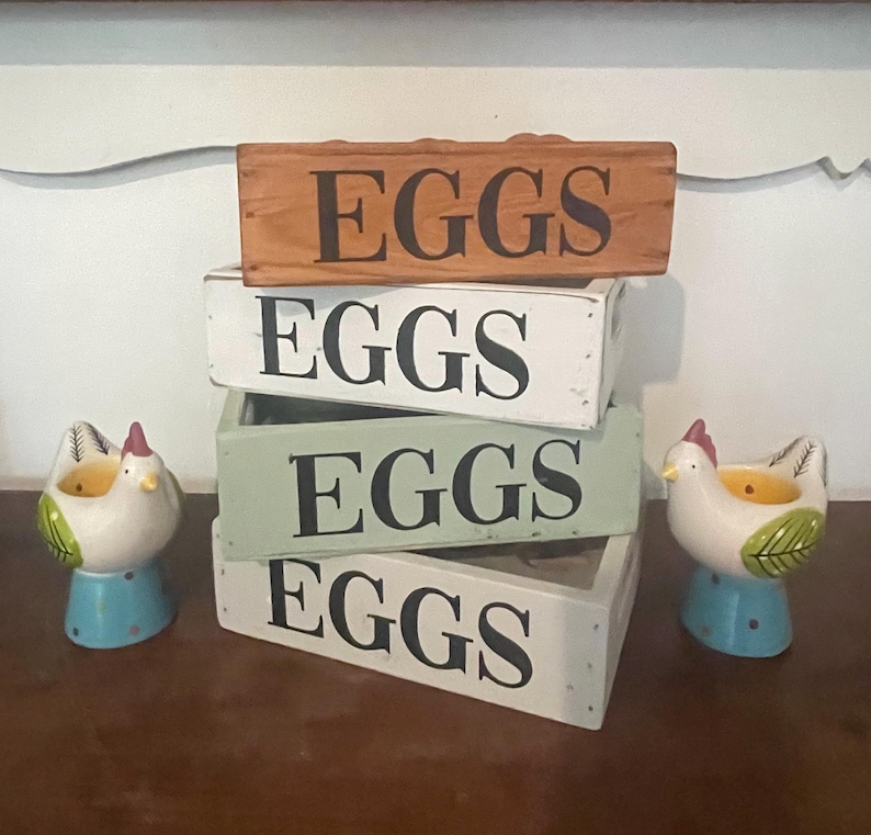 May include: A rustic wooden sign with the text "Welcome to our home" in a handwritten style. The sign features a distressed finish and a simple, inviting design, perfect for a front porch or entryway.