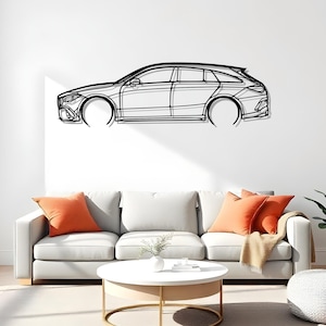 May include: Black metal wall art depicting a side profile of a station wagon. The car outline is minimalist, with details like the wheels and windows. The artwork is mounted on a white wall above a sofa with orange pillows.