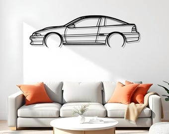 May include: Black metal wall art of a car silhouette. The artwork depicts a side profile of a coupe with details like the wheels, windows, and body lines. The car is mounted on a white wall above a white sofa with orange pillows.