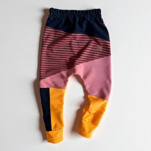 Pantaloni larghi patchwork per bambini – tonalità arancio e mattone, streetwear in cotone a zero sprechi fatto a mano