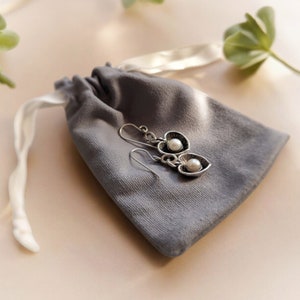 Made in Israel, Oxidized Sterling silver and freshwater pearl heart shaped dangle earrings for pierced ears