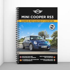 Peut inclure: Un livre à spirales intitulé "MINI COOPER R53" avec le texte "CAHIER DE RESTAURATION ET D'ENTRETIEN." La couverture présente une Mini Cooper bleue sur une route. Le texte supplémentaire comprend "RESTORATION AND MAINTENANCE LOGBOOK."