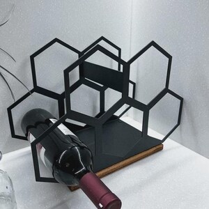 wine rack
wine holder
wine bottle holder
kitchen organizer
wine stand
kitchen wine storage
kitchen wine rack
handmade wine rack
custom wine rack
bottle stand
unique wine holder
bottle holder
unique wine rack