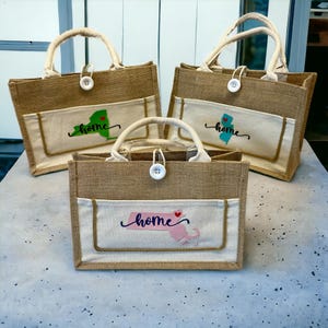 Bolsos de mano de arpillera, carteras del estado de origen