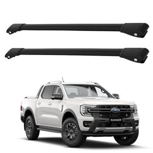 May include: Two matte black roof rack crossbars with aerodynamic profiles and secure mounting ends, positioned above a white Ford Ranger pickup truck featuring a black front grille, black bumper, and black wheels with the word RANGER on the plate.