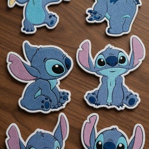 May include: Embroidered patches featuring the blue alien Stitch from Lilo & Stitch. The patches depict Stitch in various poses, including holding ice cream and playing a ukulele. Each patch has a white border and is set against a wooden background.
