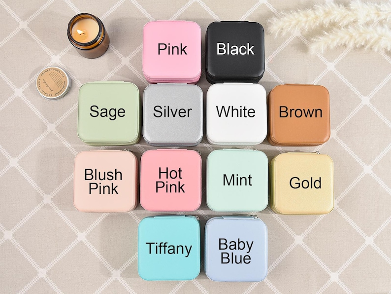 May include: Twelve small square boxes with different colors and labels. The labels include: Pink, Black, Sage, Silver, White, Brown, Blush Pink, Hot Pink, Mint, Gold, Tiffany, and Baby Blue.