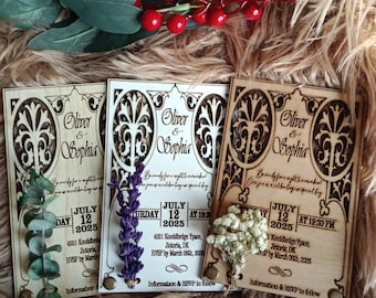 May include: Three laser-cut wooden save-the-date cards with a floral design. The cards are white, brown, and natural wood. Each card has the text "Oliver & Sophia" and the date "July 12, 2025".