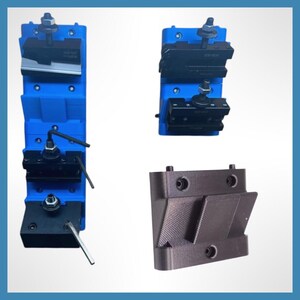 May include: Three metal tool holders. Two are blue with black components and the third is black. The blue holders have multiple levels with adjustable parts. The black holder has a unique angled design.
