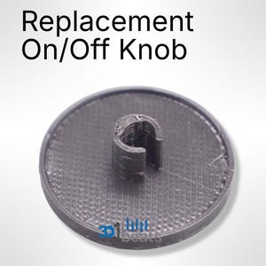 May include: A black plastic replacement knob for an on/off switch. The knob has a circular base and a raised ring in the center.
