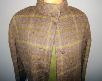 May include: A brown and green plaid jacket with a high collar and button closure.