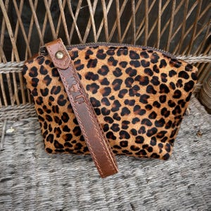 Leopard print bag with top zip