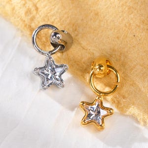 Labret pendentif étoilé en titane 18/16 g • Boucle d'oreille filetée à l'arrière plat • Clous tragus • Clous hélicoïdal • Clous CZ • Clous pour cartilage • Piercing nez