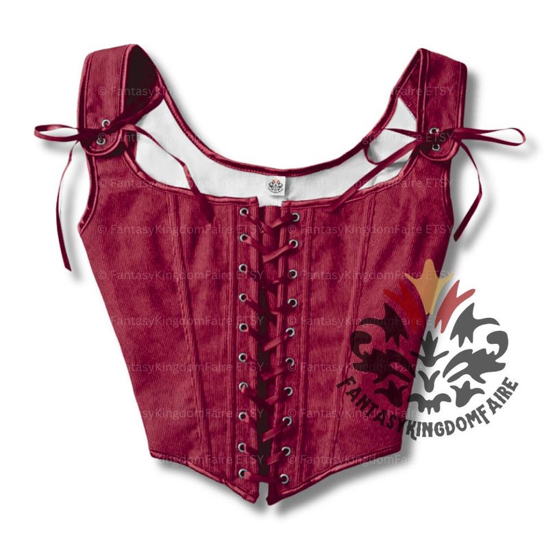 May include: A burgundy corset with a square neckline and adjustable shoulder straps. The front features a lace-up closure with metal eyelets. The corset is made of a ribbed fabric and has decorative ties at the shoulders. The Fantasy Kingdom Faire logo is visible.